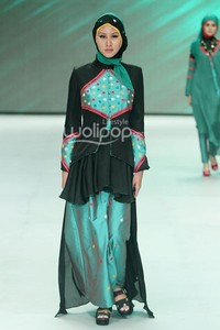 Safartiwi Gadeng Pesona Rempelis. Fashion Parade - Ethic Spiritual. Indonesia Fashion Week 2014 at Jakarta Convention Center. Senayan. Jakarta. [Foto: Mohammad Abduh/Wolipop]