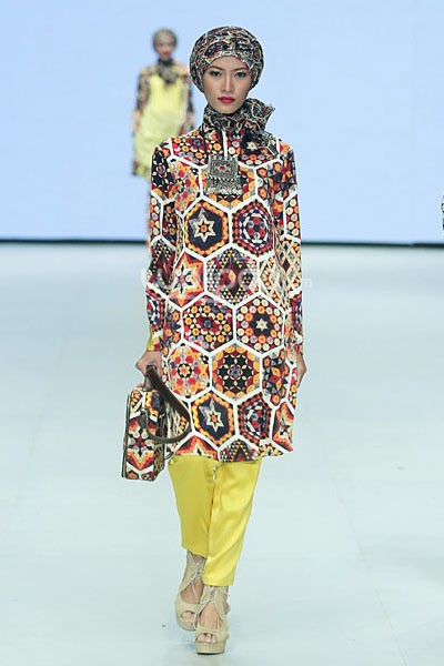 Itang Yunasz Occident Orient Revealing Innocence. Indonesia Fashion Week 2014 at Jakarta Convention Center. Senayan. Jakarta. [Foto: Mohammad Abduh/Wolipop]