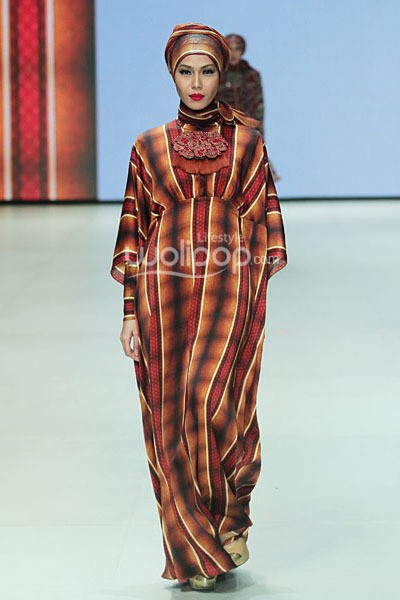 Itang Yunasz Occident Orient Revealing Innocence. Indonesia Fashion Week 2014 at Jakarta Convention Center. Senayan. Jakarta. [Foto: Mohammad Abduh/Wolipop]