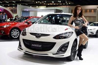 Sales Promotion Girl di booth Mazda. Dengan gaun yang agak gelap.