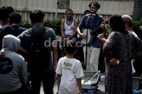 Aksi Ram Salivia saat mengamen di Bundaran HI.