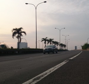 Wusss... Beginilah Suasana Lengang Tol Lingkar Luar di Hari Pencoblosan