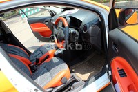 Eksteriornya, dia hanya menggunakan cutting sticker oranye dan hitam serta knalpot upswept kansai+5zigen Rp 17 juta, sedangkan interiornya dia menggunakan jok MB-tech superior serta sound system pioneer.