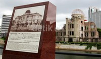 Batu prasasti berdiri di pinggiran kanal setelah serangan bom. Berkat keteguhan masyarakat Jepang dalam menghadapi akibat bom atom yang mengerikan itu, masyarakat Hiroshima dan Mazda bisa kembali bangkit.