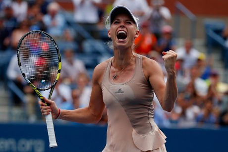Wozniacki Singkirkan Sharapova untuk Lolos ke Perempatfinal