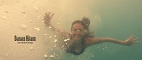Aktris sekaligus penggila wisata alam Nadine Chandrawinata nampak asyik saat berenang. (Dok Rapi Films)