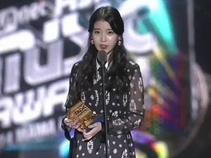 IU Diberi Gelar Most Popular Vocalist Award di MAMA 2014