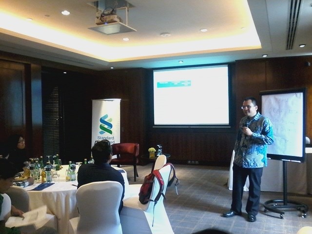 Standard Chartered: Dolar Bisa ke Rp 11.900 Tahun Depan