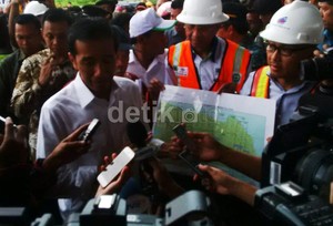 Hujan Deras Iringi Presiden Jokowi Terbang ke Papua