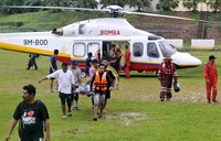 Helikoter dikerahkan untuk mengevakuasi korban banjir, Jumat (26/12/2014). Nazirul Roselan/Reuters/detikFoto.