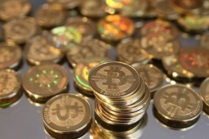 Mata Uang Kontroversial Bitcoin Merambah Indonesia