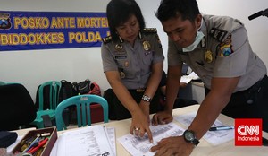 Kerja Keras DVI Ungkap 34 Identitas Korban AirAsia dalam 12 Hari