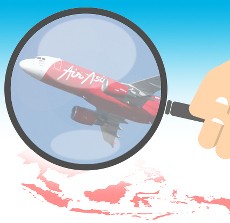 Penyelam TNI AL Miringkan Badan Pesawat untuk Evakuasi Jenazah