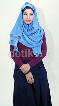 Bella saat melakukan sebuah pemotretan. Pool/Akew/detikFoto.