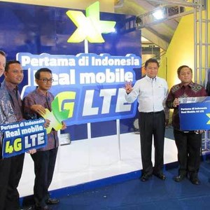 Beli Axis, XL Rugi Rp 891 Miliar di 2014