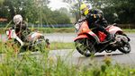 Motor Skutik Ngebut di Sirkuit