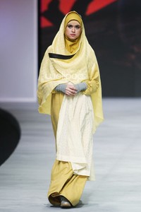 Irna Mutiara With Zelmira Miracle of The Sun. Indonesia Fashion Week 2015 at Jakarta Convention Center. Senayan. Jakarta. [Foto: Mohammad Abduh/Wolipop]