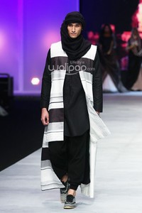 Irna Mutiara With Zelmira Miracle of The Sun. Indonesia Fashion Week 2015 at Jakarta Convention Center. Senayan. Jakarta. [Foto: Mohammad Abduh/Wolipop]