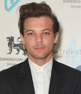 Louis Tomlinson Rilis Label Rekaman, One Direction Jadi Musisi Pertama?