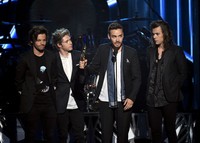 Dua penghargaan yakni, Top Duo/Group dan Top Touring Artist sukses dibawa pulang oleh One Direction. Ethan Miller/Getty Images/detikFoto.