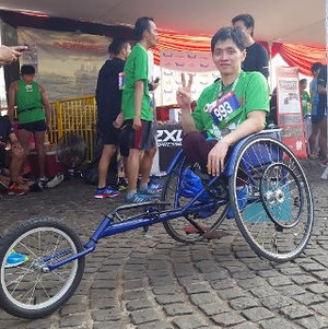 Semangat Berolahraga Johan dari Atas Kursi Roda