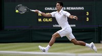Djokovic bertarung melawan Marin Cilic di perempatfinal Wimbledon 2015. Henry Browne/Reuters/detikFoto.