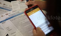 Biayanya cukup membayar Rp 50.000 setahun dan bisa mendaftar lewas SMS.