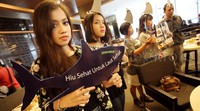 Sejumlah aktivis menggelar aksi di salah satu resto di kawasan Jakarta.