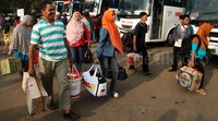 Para pedagang jamu mengikuti mudik gratis yang digelar Sido Muncul.