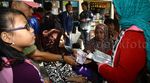 Penjual Uang Receh Sasar Pemudik