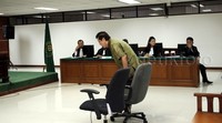 Willy menghadiri sidang vonis di Pengadilan Tipikor, Jakarta.