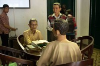 Ruang pertama adalah ruang pengenalan yang dilengkapi dengan diorama pemuda yang terlihat sedang belajar. Tampak juga pajangan buku tua yang disusun rapi di atas meja (Randy/detikTravel)