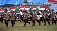 Upacara itu mengusung tema 'Pramuka Garda Terdepan Pelaku Perubahan dalam Pembentukan Karakter Kaum Muda'.