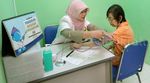 Perpustakaan dan Layanan Kesehatan di Pasar Manggis