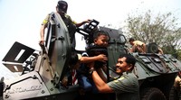 Sejumlah anak menjajal menaiki Panser Anoa 6x6.