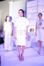 Raisa Cantik Berbibir Merah