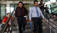     Marisi keluar Gedung KPK, Jl HR Rasuna Said, Jakarta Selatan, sekitar pukul 16.00 WIB, Jumat (28/8/2015).     