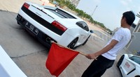 Lamborghini Aventador melakukan persiapan start test ride dalam ajang 'Supercar Taxi Ride' di Pameran GIIAS, ICE, BSD, Tangerang Selatan, Jumat (28/8/2015). Pool/Aris Ginanjar/detikFoto.