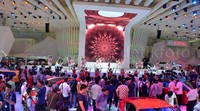 Para SPG memamerkan mobil masa depan Toyota, I-Road. Pool/Aris Ginanjar/detikFoto.