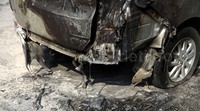 Bagian belakang Honda Mobilio tampak menghitam.