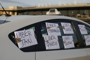 Suara Pembelaan Uber: Kami Bukan Perusahaan Taksi!