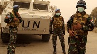 Pasukan perdamaian PBB di Lebanon berpatroli menggunakan masker. Aziz Taher/Reuters/detikFoto.