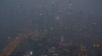 Asap pekat menyelimuti gedung-gedung pencakar langit di Singapura. Edgar Su/Reuters/detiKFoto.