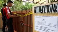 Rumah yang dikosongkan itu dipasangi garis polisi. Pool/Lamhot Aritonang/detikFoto.