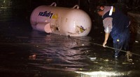 Tsunami yang dipicu gempa berkekuatan 8,3 SR ini membanjiri kawasan pantai setempat.
