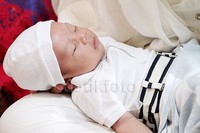 Rafathar tertidur pulas saat syukuran akikah yang digelar pada akhir pekan lalu. Pool/Gus Mun/detikFoto.