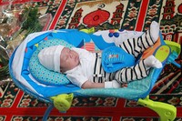 Rafathar tampak tertidur pulas saat syukuran akikah yang digelar akhir pekan lalu. Pool/Gus Mun/detikFoto.