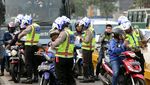Terobos Jalur TransJ, Puluhan Pemotor Ditilang