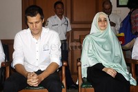 Saat di dalam ruang sidang, Risty terlihat tenang dan selalu tersenyum. Pool/Noel/detikFoto.