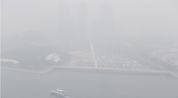 Gedung-gedung pencakar langit nyaris tak terlihat. Edgar Su/Reuters/detikFoto.